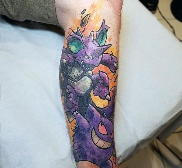 Vibrant tattoo of Nidoking and Gengar in a bold, action-packed scene with dynamic colors and comic-style energy bursts.