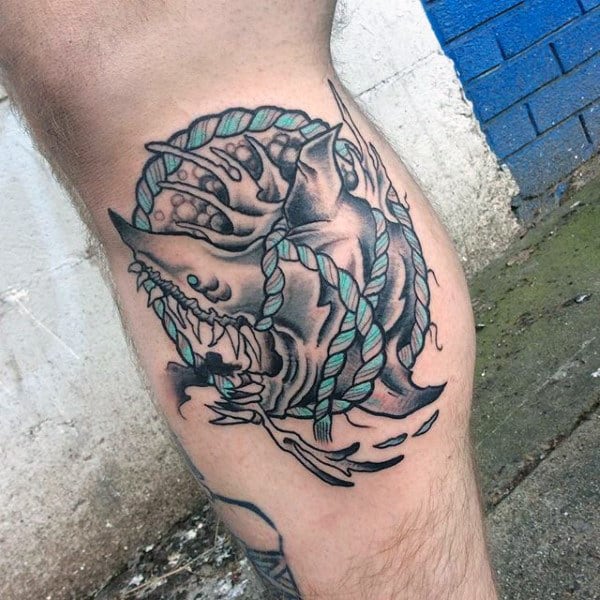 Guys Legs Blue Rope Around Sea Urchin Tattoo