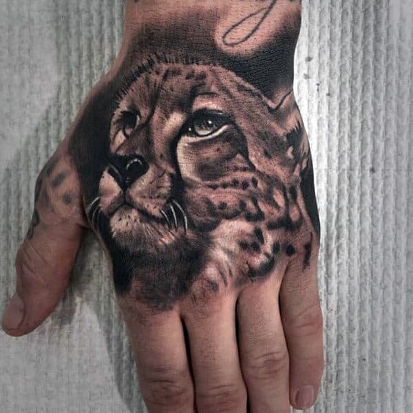 Guys Leopard Hand Tattoos