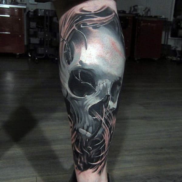 Guys Lower Legs Skull Tattoo