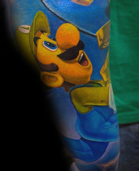 Realistic tattoo of Luigi with a shocked expression, surrounded by a blue and gold background, capturing a dynamic and immersive scene.