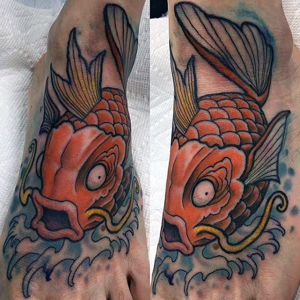 Bold Magikarp foot tattoo with intense expression, traditional Japanese-style waves, and rich orange and yellow tones.