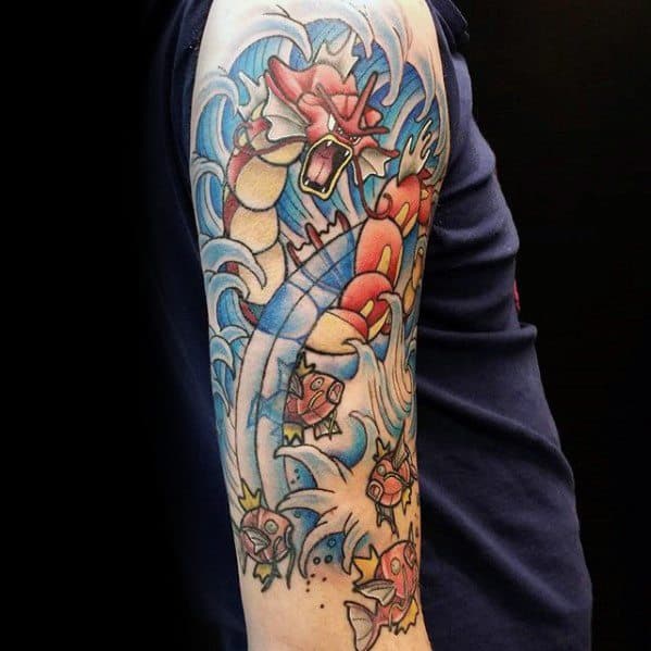 Full-sleeve tattoo showing Magikarp transforming into Gyarados, with swirling water and dynamic motion throughout the design.