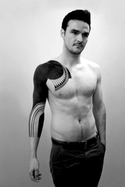 Guys Masculine All Black Chest And Sleeve Tattoo Inspiration