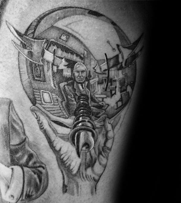 Tattoo inspired by Escher’s “Hand with Reflecting Sphere,” featuring a surreal twist with a mechanical drill piercing the glass orb.