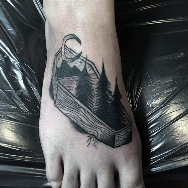 Guys Nature Cofffin Tattoo On Foot