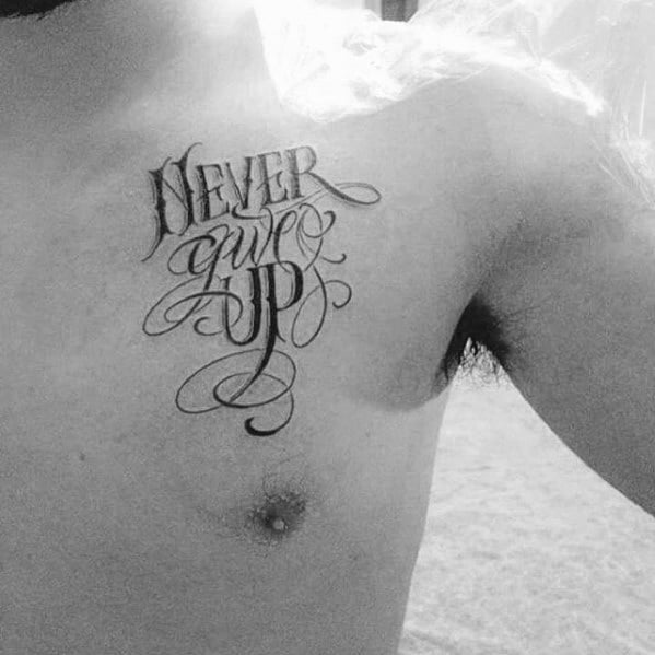 Guys Never Give Up Chest Tattoo Designs