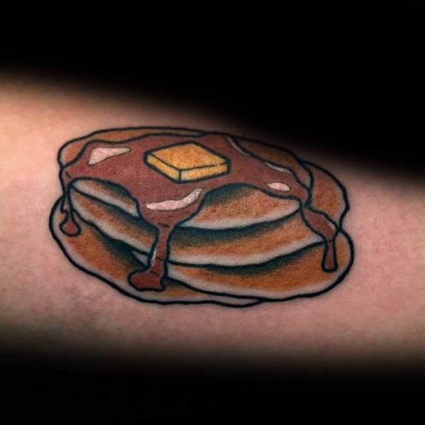 Simple pancake tattoo with syrup and a butter pat, outlined in bold black for a classic and traditional tattoo style.