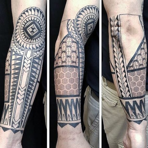 Geometric sleeve tattoo on a person's arm with tribal-inspired patterns