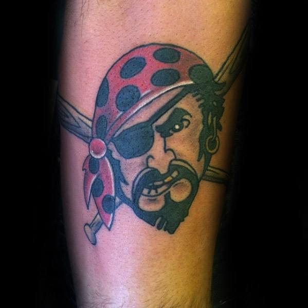 Classic Pittsburgh Pirates logo tattoo featuring a fierce pirate with an eye patch, red bandana, and crossed baseball bats.