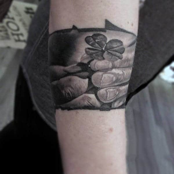 Guys Realistic Tattoos Of Four Leaf Clovers On Forearm