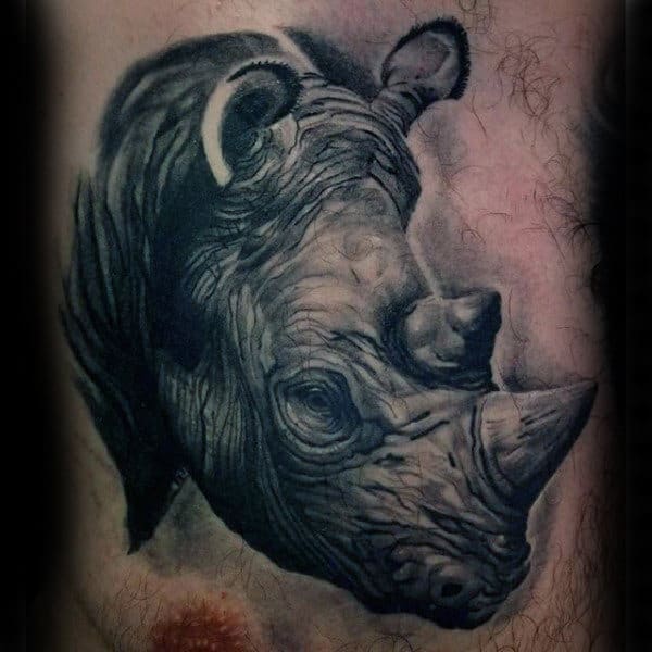 Guys Rhino Chest Tattoo Designs