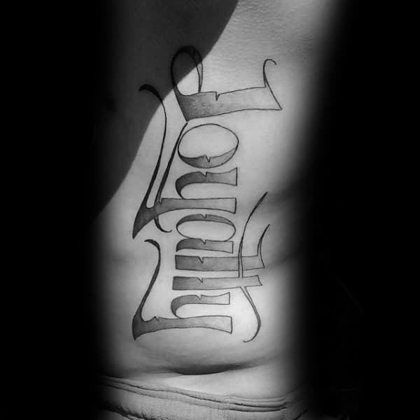 Guys Rib Cage Side Tatto Of Loyalty Lettering