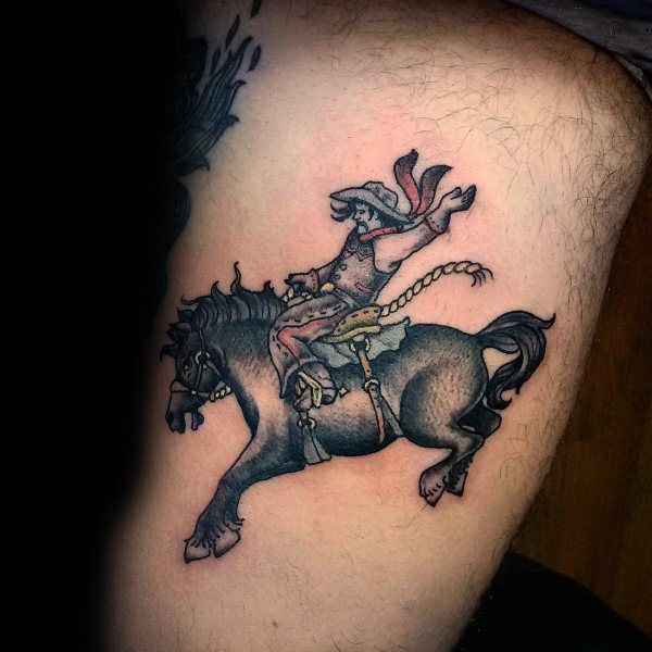 Traditional-style tattoo of a cowboy riding a bucking horse, featuring bold outlines, dynamic motion, and classic Western-inspired shading.