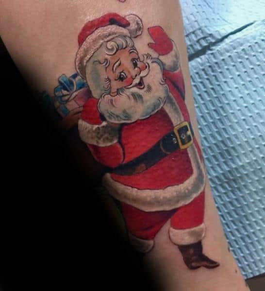 Classic Santa Claus tattoo with a vintage-inspired design, featuring rosy cheeks, a joyful expression, and a sack of presents in vibrant colors.