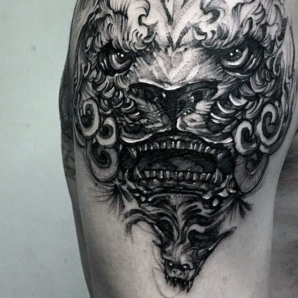 Guys Shaded Black And Grey Upper Arm Foo Dog Tattoo