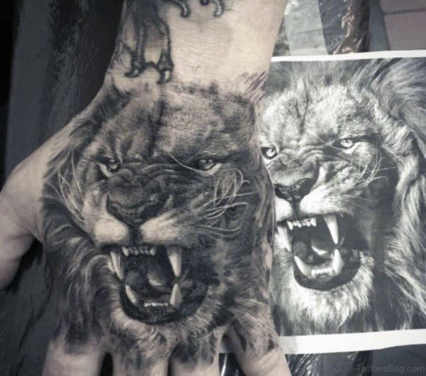Guys Shaded Realistic 3d Lion Hand Tattoo
