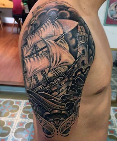 Guy's Ship In Storm Tattoo On Arm And Shoulder