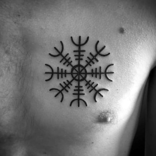 Guys Simple Upper Chest Black Ink Tattoos With Helm Of Awe Design