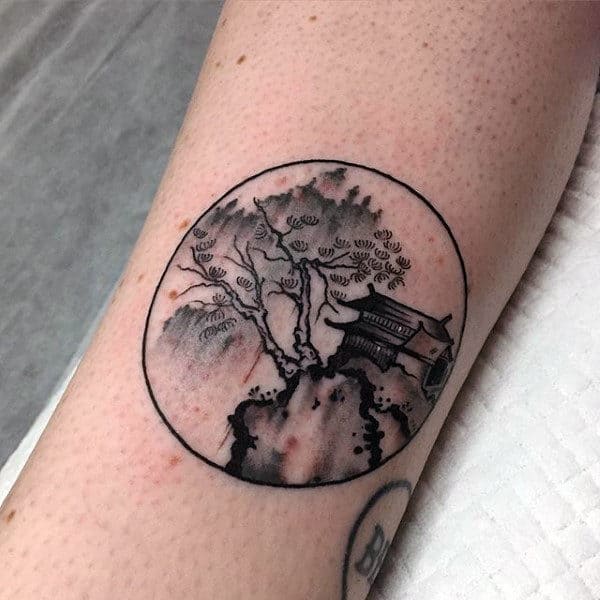 Guys Small Simple Circle Chinese Nature Tattoo On Forearm