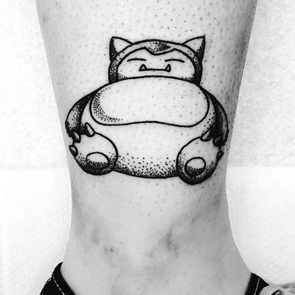 Bold Snorlax tattoo on ankle with black ink, clean lines, and stippling detail emphasizing its round, relaxed shape.