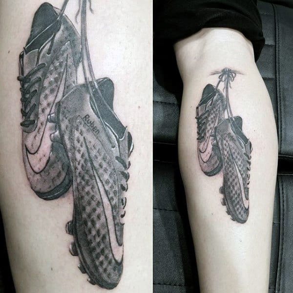 Guys Soccer Playing Shoes Tattoo On Leg