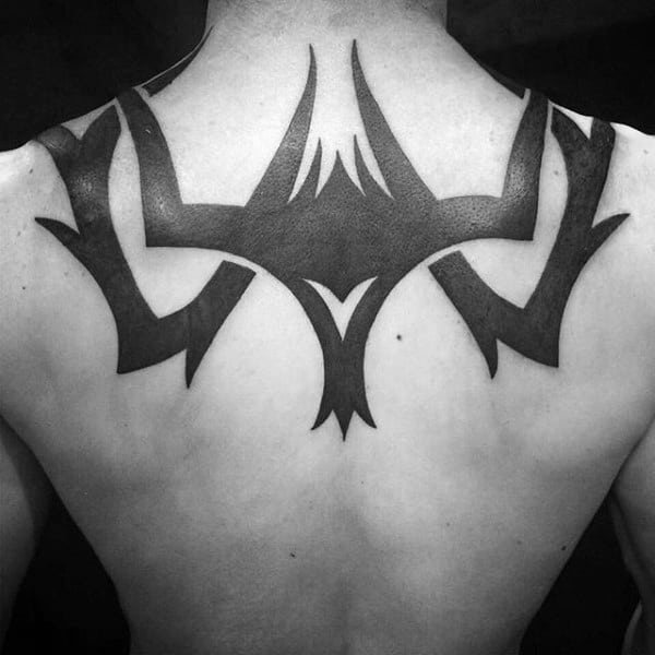 Guys Solid Black Ink Tribal Upper Back Tattoos