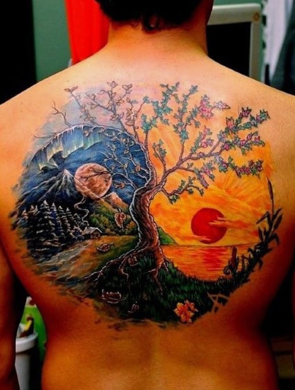 Guys Sun And Moon Tattoo On Back
