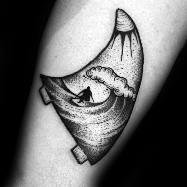 Creative blackwork tattoo of a surfer riding a wave inside a surfboard-shaped mountain scene with dotwork shading and bold lines.