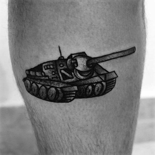 Blackwork tank tattoo with bold outlines and dot shading, featuring a simplified, cartoon-like design on the calf.