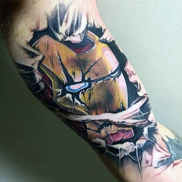 Iron Man tattoo featuring a powerful depiction of his helmet breaking through the skin, with vibrant colors and detailed shading to create a dramatic, 3D effect.