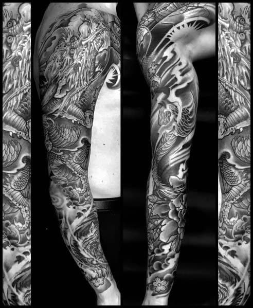 Black and grey full-sleeve tattoo featuring a detailed Japanese-style dragon, phoenix, and swirling clouds for a bold and dynamic design.