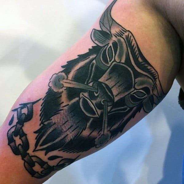 Guy's Tattoo Bulls On Bicep