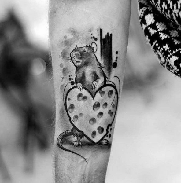 Black and gray tattoo of a rat sitting on a heart-shaped wedge of Swiss cheese, featuring fine shading, bold outlines, and abstract background details.