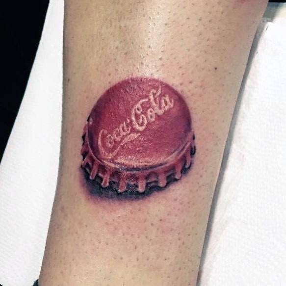 Hyper-realistic Coca-Cola bottle cap tattoo with detailed shading, highlights, and a 3D effect, creating a lifelike and nostalgic design.