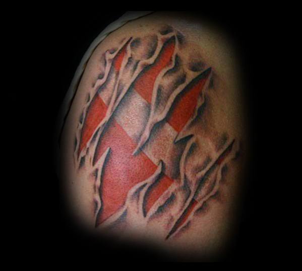 Tattoo of torn skin revealing a red and white dive flag beneath, symbolizing a deep passion for scuba diving and an unbreakable connection to the ocean.