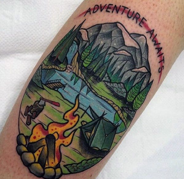 Colorful camping tattoo with a campfire, tent, mountains, river, and trees, featuring the phrase “Adventure Awaits” above the scene.