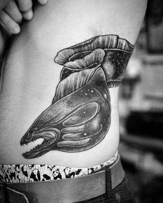 Guys Tattoo Ideas Eel Designs On Rib Cage Side