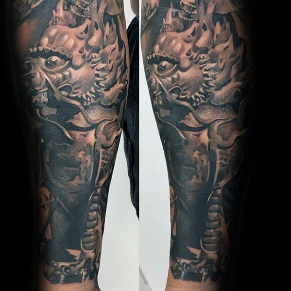Dark and dramatic Kirin tattoo sleeve in black and grey, featuring intense shading, fierce expression, and powerful mythical symbolism.