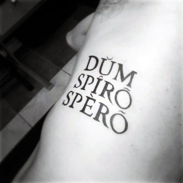 Guys Tattoo Ideas Latin Designs On Rib Cage Side Of Body