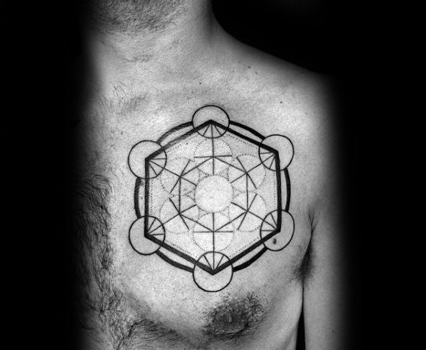 Chest tattoo of Metatron’s Cube with thick outer circular lines and a radiant center, combining bold geometry with fine inner detailing.
