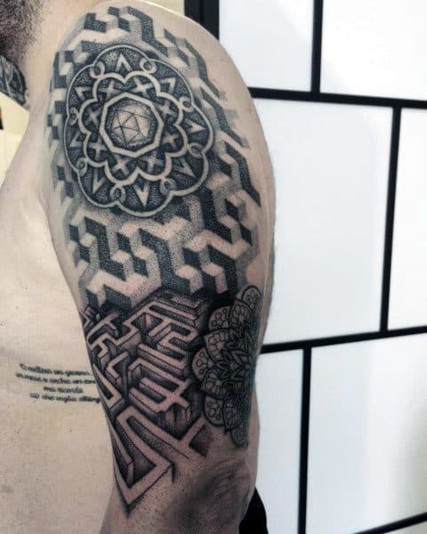Black and grey tattoo sleeve with a geometric labyrinth design on the upper arm, featuring 3D patterns, mandalas, and intricate shading.