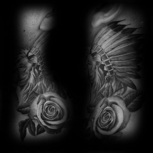 Detailed black and gray lion neck tattoo featuring a Native American headdress and roses, blending strength, heritage, and elegance.