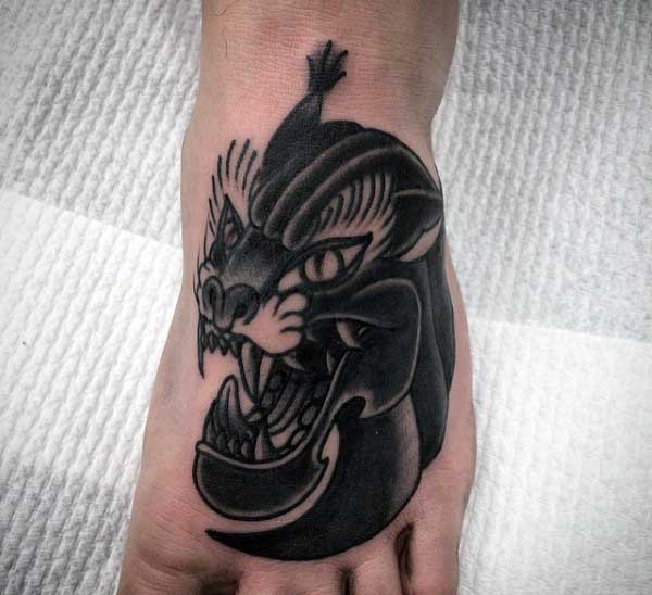 Guys Tattoo Of Black Panther On Foot