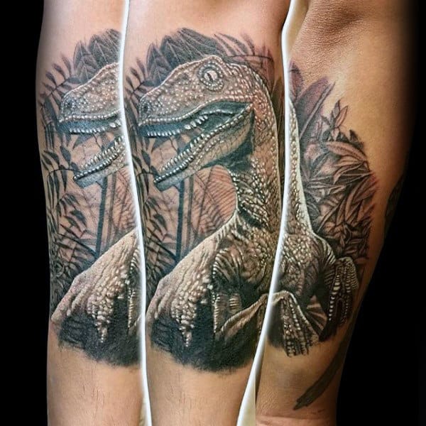 Guys Tattoo On Outer Forearm Of Velociraptor