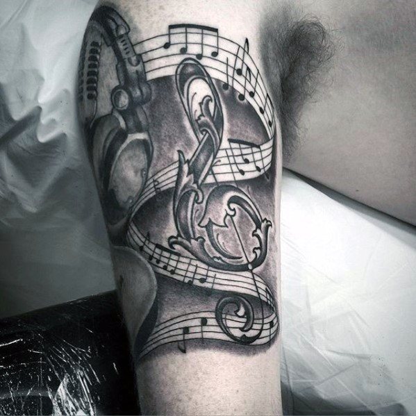 Guys Tattoos With Headphones Music Notes Design On Arm