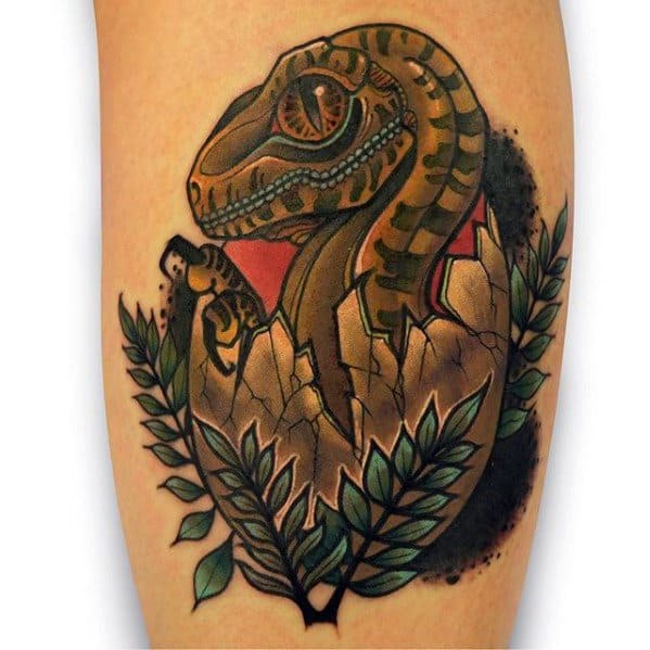 Guys Tattoos With Jurassic Park Dinosaur Egg Design On Arm