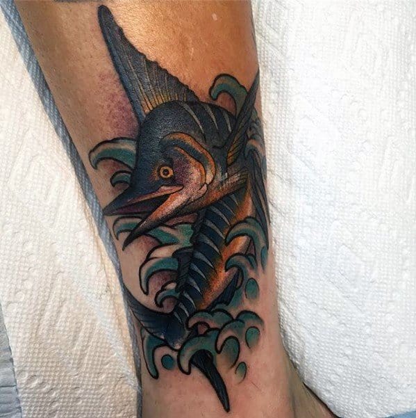 Guys Tattoos With Marlin Design On Lower Leg