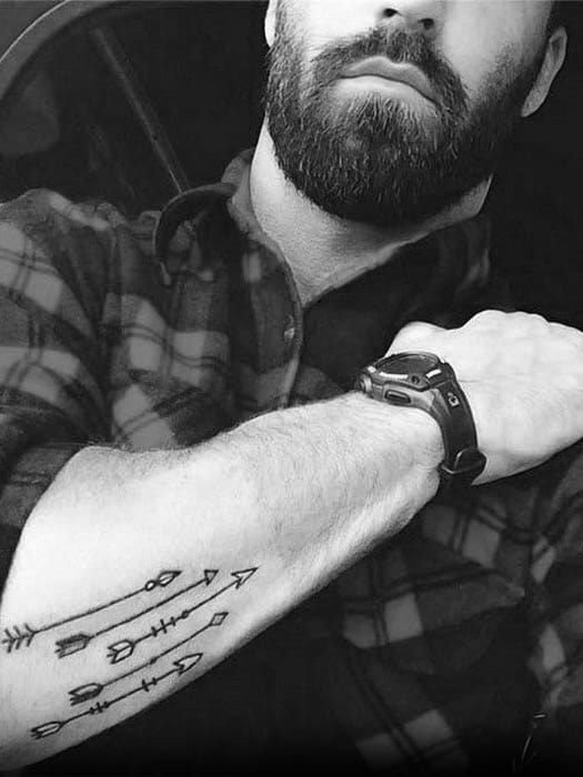 Guys Tattoos With Small Arrow Design Outer Forearm