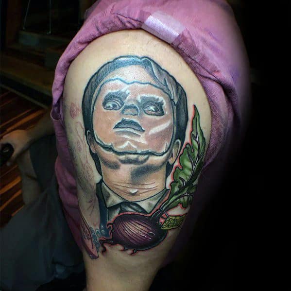 Color tattoo of Dwight Schrute wearing the CPR dummy face from The Office, with a beet from Schrute Farms incorporated into the design.